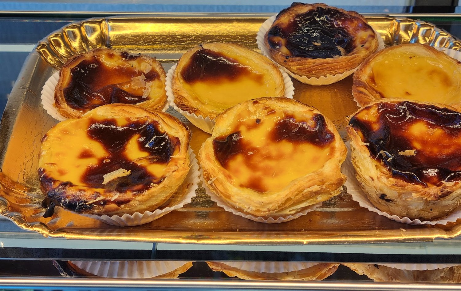 Fresh pastel de nata tarts, close up